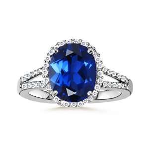 Oval Lab Created Sapphire and Simulated Diamond Split Shank Ring in 