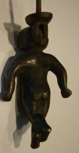 From an estate, a charming antique figural bronze cherub / child 