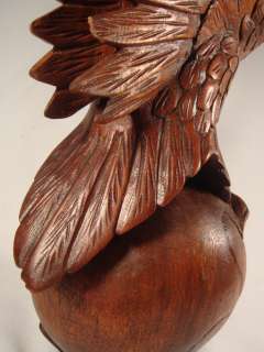   Carved Suar Wood Bald Eagle with Open Mouth on Globe Statue  