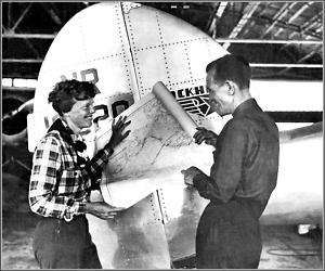 Photo: Amelia Earhart & Fred Noonan Inspect Map  