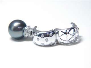WE ARE OFFERING THIS VERY RARE 13MM BLACK PEARL ENHANCER WITH .72CT 