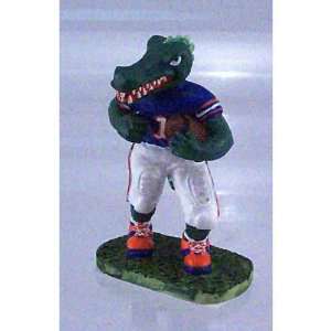   Mini Gator Figurine W/Ball in Left Hand Running Left Sports