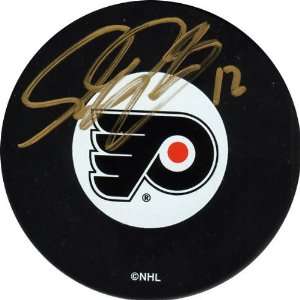 Simon Gagne Philadelphia Flyers Autographed Hockey Puck:  