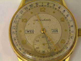   Movado watch dial, crystal, case, and movement for gents. Details are