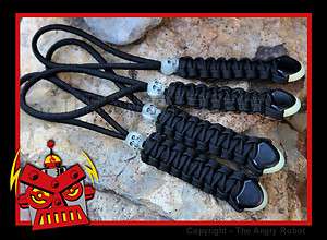   of 4 Black Paracord Lanyards with Glow Ends Glow Skull Beads  