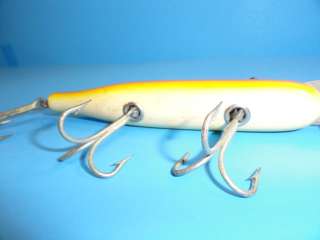   lure wood with glass eyes blue red yellow with white belly this lure