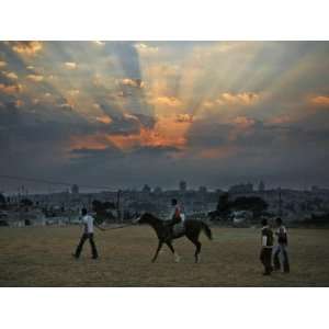 Arab Children Walk with Horse at Muslim Holiday of Eid Al Fitr 