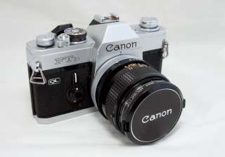 Canon FTb with 35mm 3.5 lens, lens case and camera case all in 