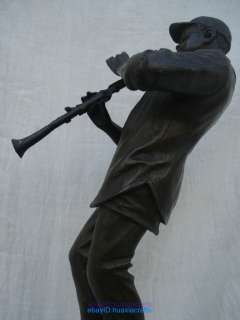 Bronze statue sculpture wind instrument African boy  