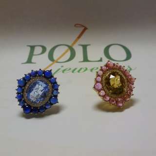   Judith Ripka 18kt. gold, post and Omega clip earrings are from her